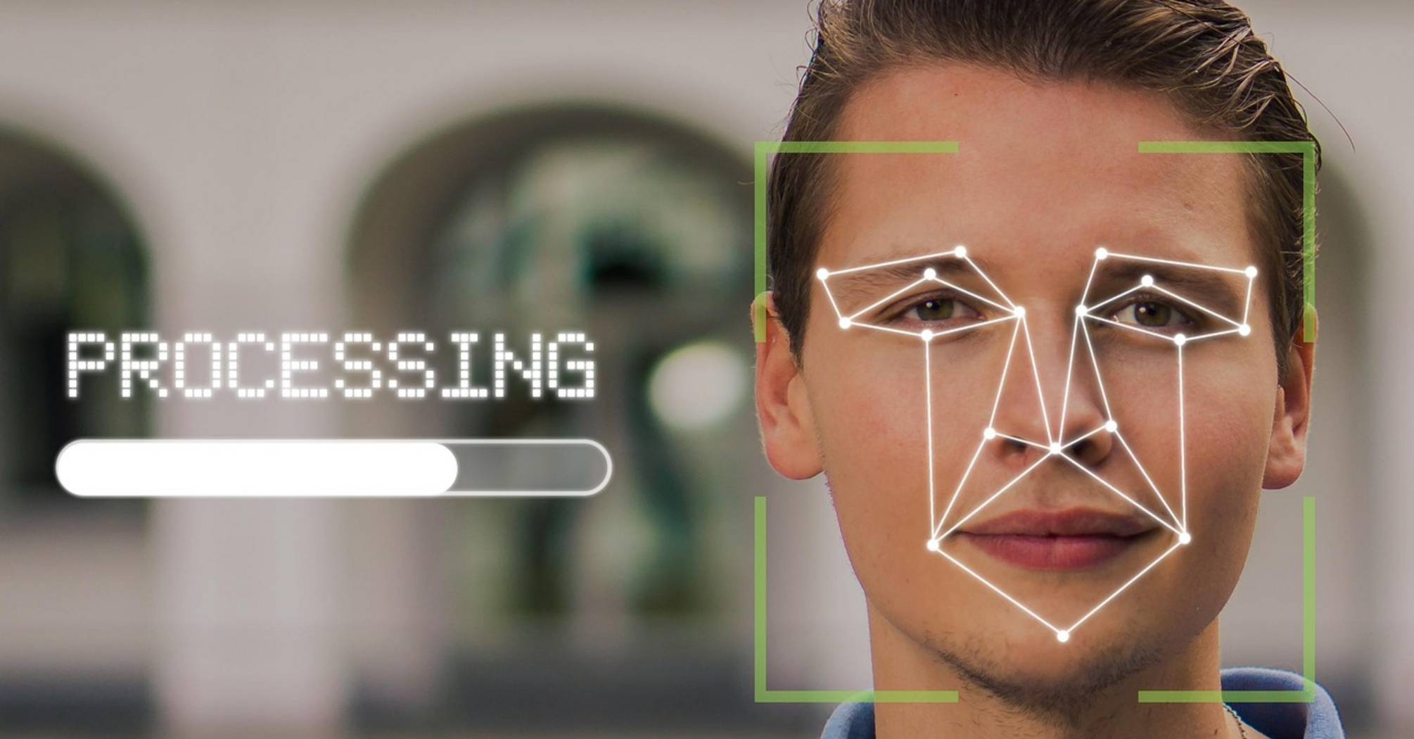 Facial recognition scan on man's face with processing overlay