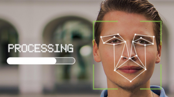 Facial recognition scan on man's face with processing overlay
