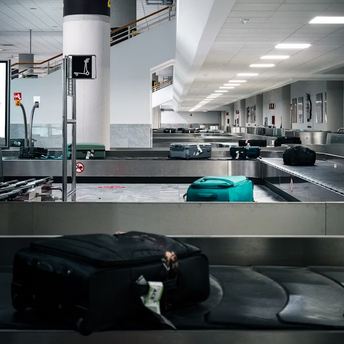 Luggage on an airport baggage carousel
