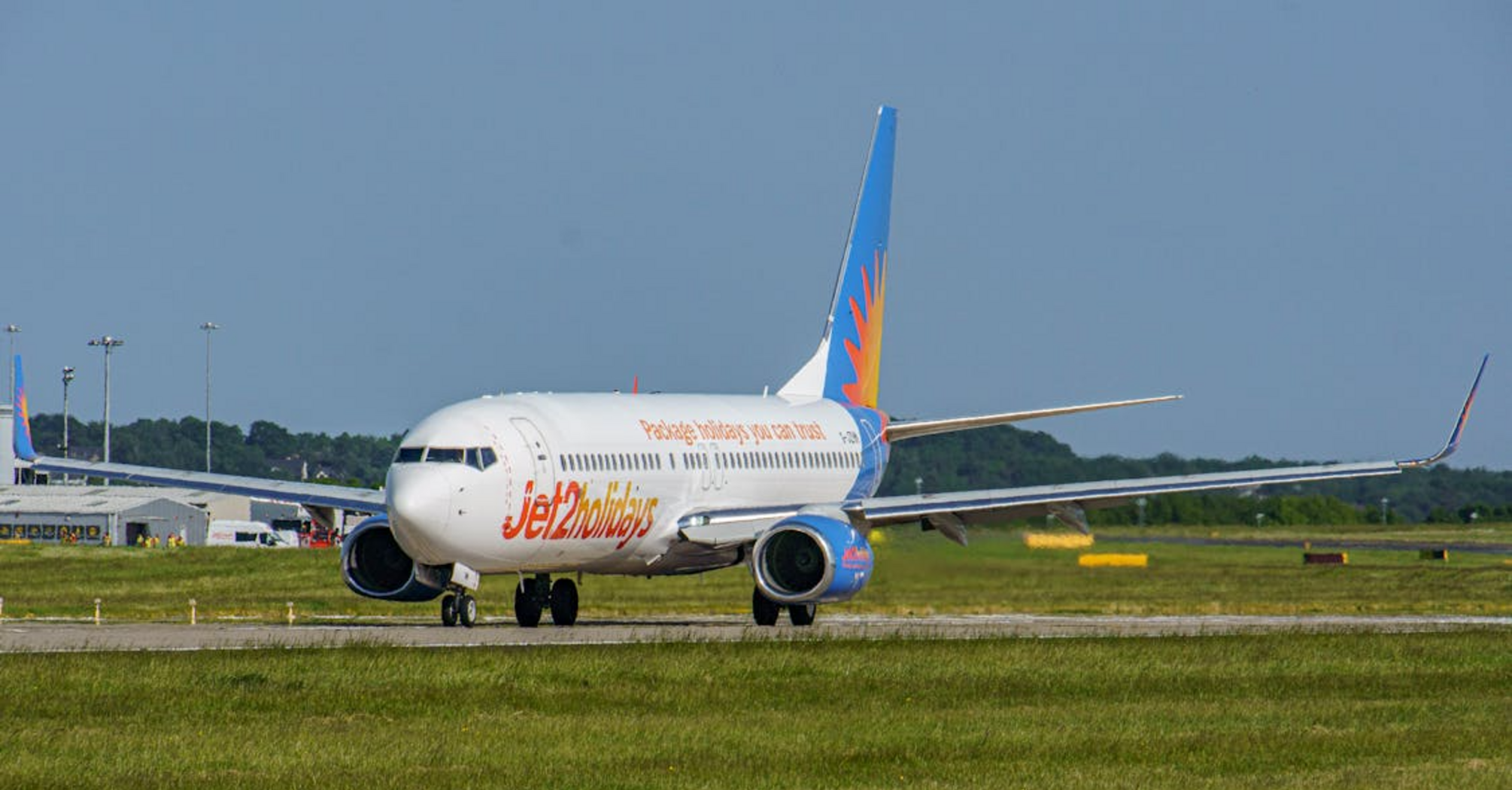 Jet2holidays aircraft taxiing on runway at an airport