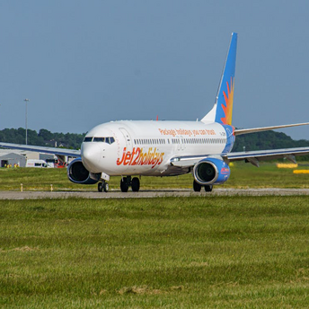 Jet2holidays aircraft taxiing on runway at an airport