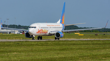 Jet2holidays aircraft taxiing on runway at an airport