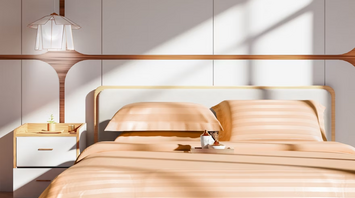 Modern hotel bedroom with sunlight streaming in