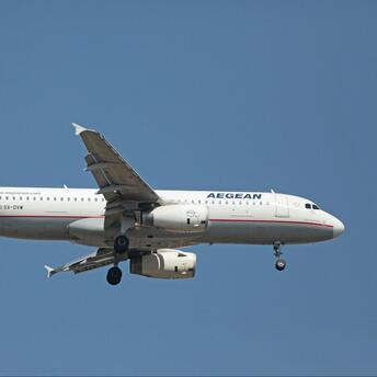 AEGEAN airplane approaching runway during daylight