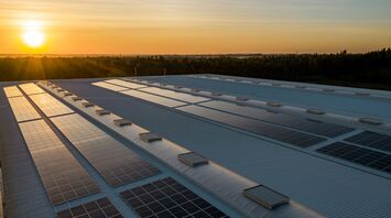 Solar panels on airport rooftops at sunset