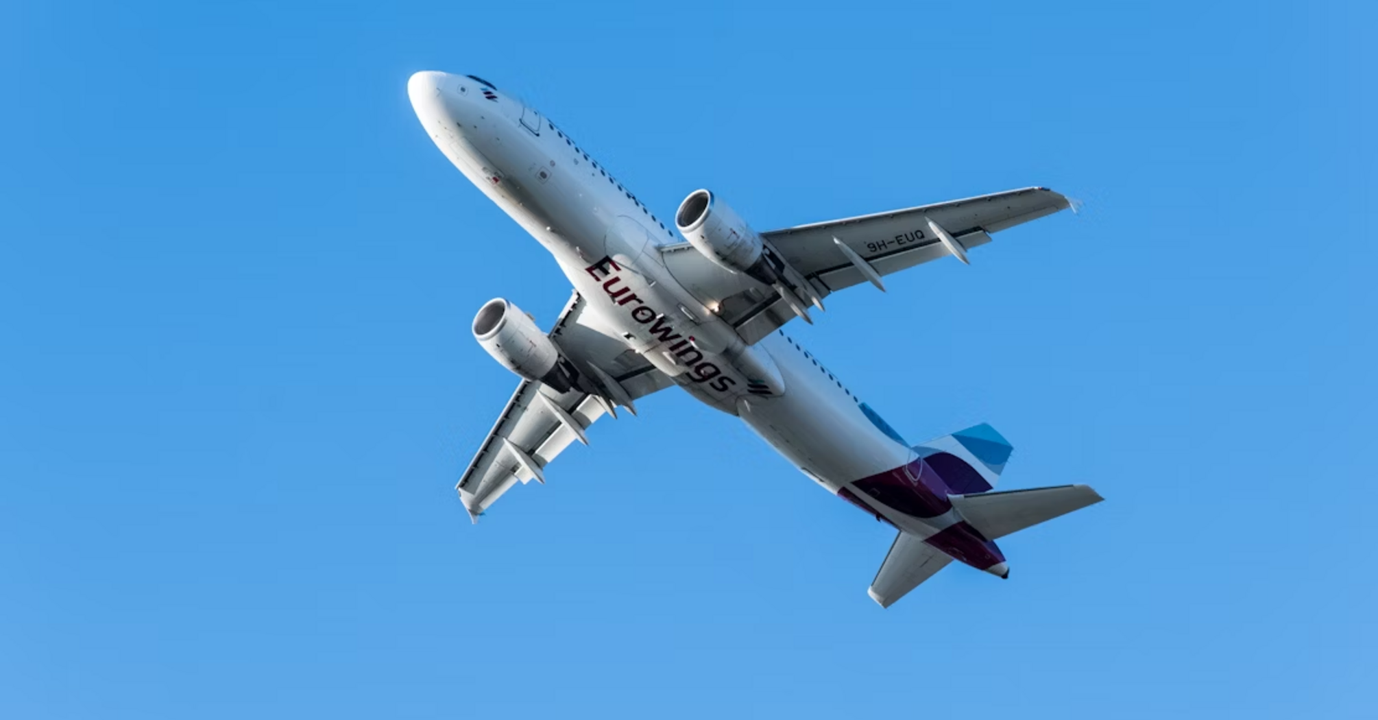 Eurowings airplane in flight against clear sky