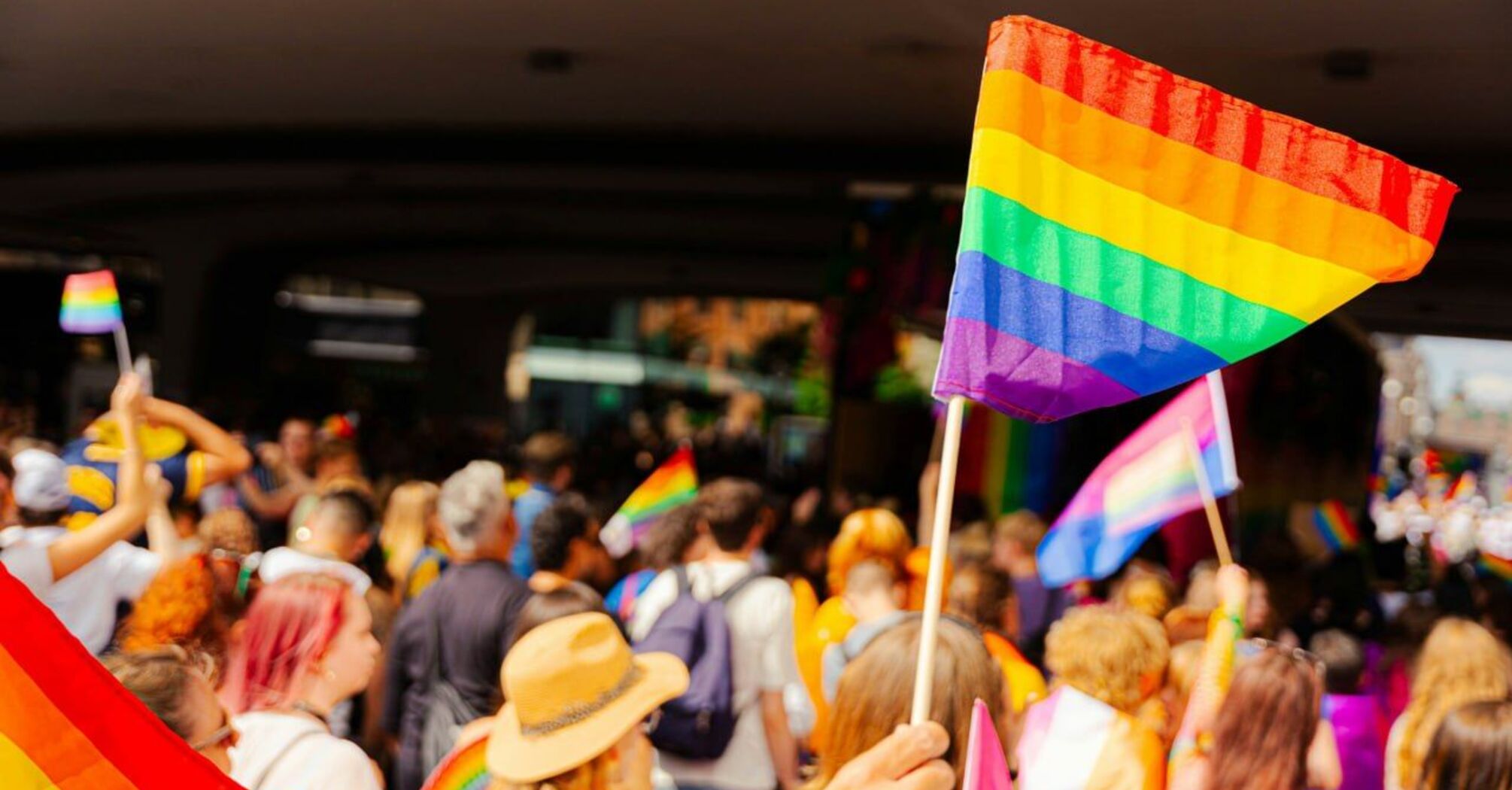 Rainbow flags waving at Amsterdam Pride parade