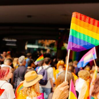Rainbow flags waving at Amsterdam Pride parade