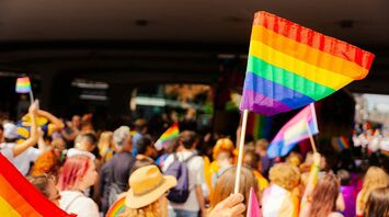 Rainbow flags waving at Amsterdam Pride parade