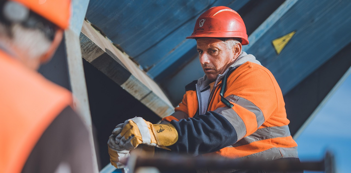 Railway workers performing maintenance during infrastructure upgrade