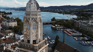 View of Zurich's historic tower overlooking Lake Zurich and cityscape
