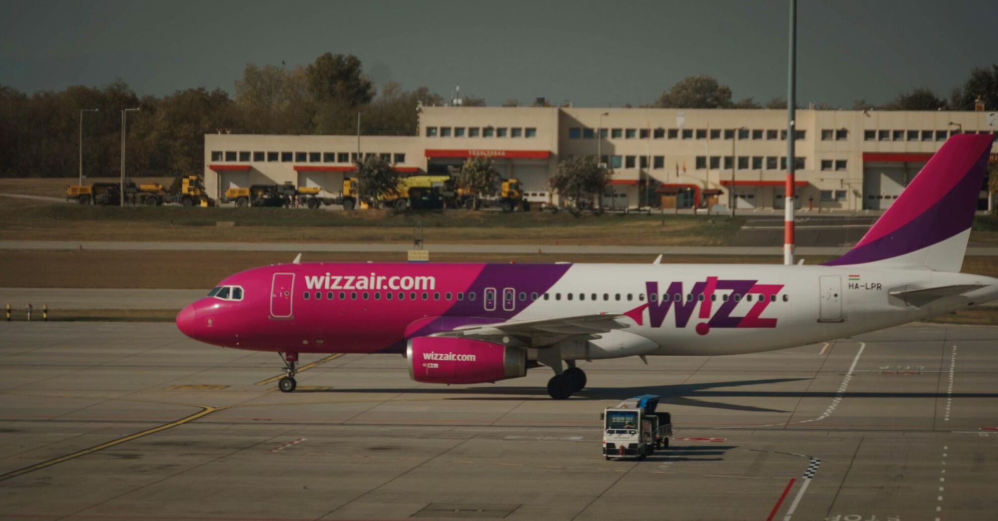 Wizz Air aircraft on runway at Tirana Airport