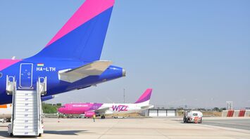 Close-up of Wizz Air aircraft tails on airport apron
