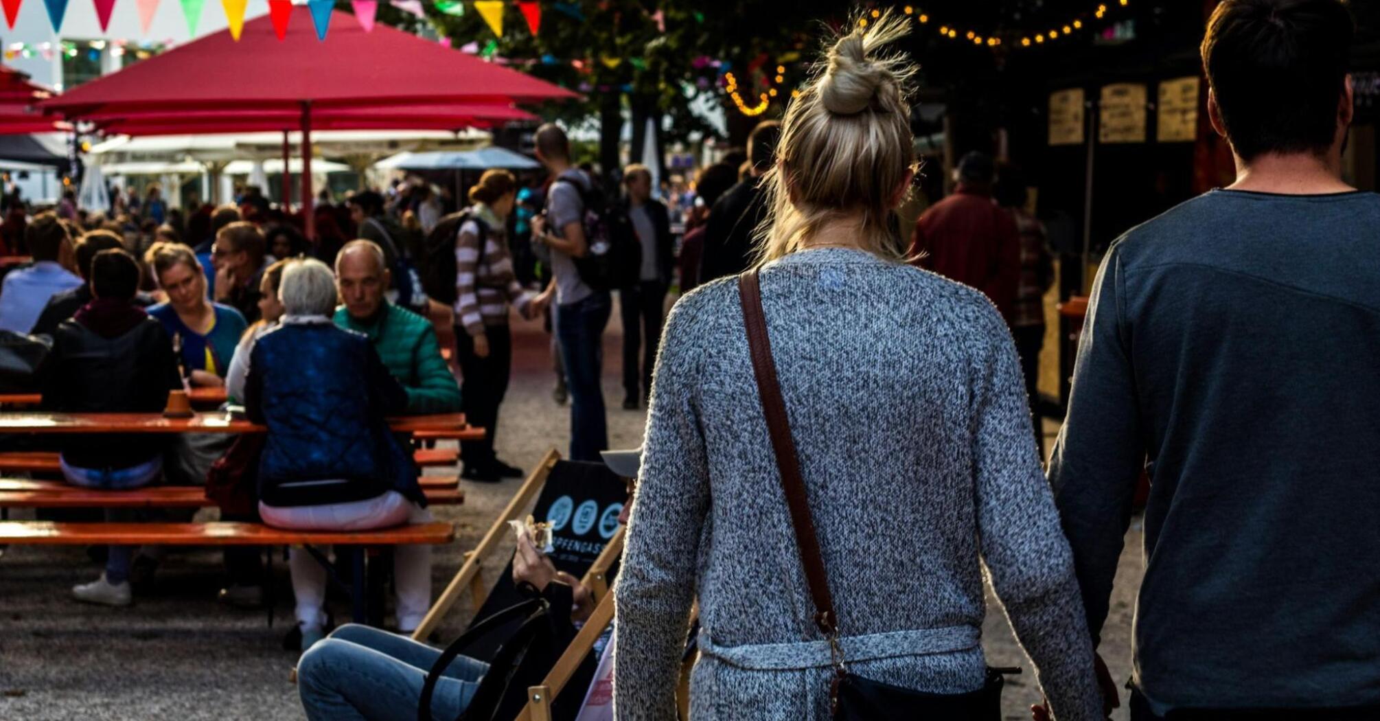 People enjoying food festival outdoors
