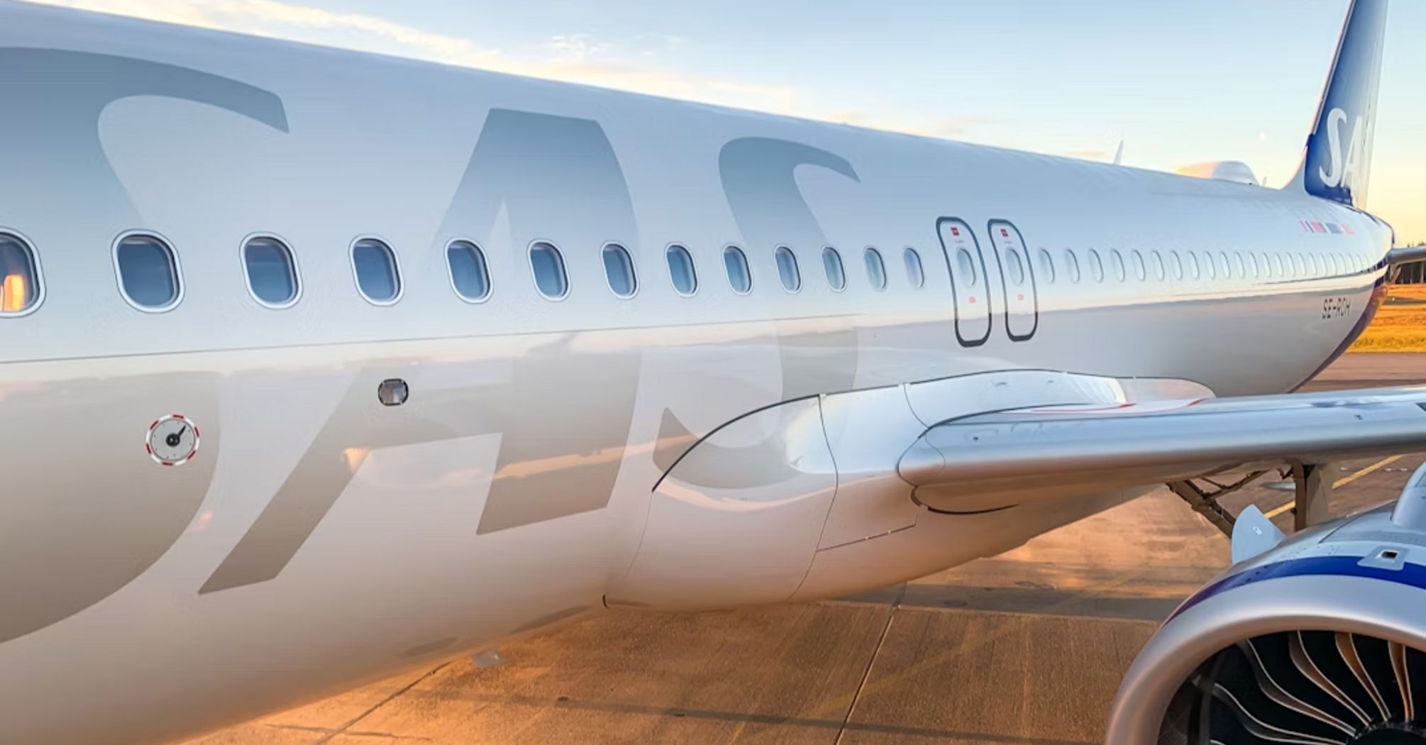 Scandinavian Airlines aircraft parked on runway