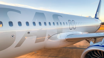 Scandinavian Airlines aircraft parked on runway
