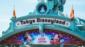 Tokyo Disneyland entrance decorated for holiday season