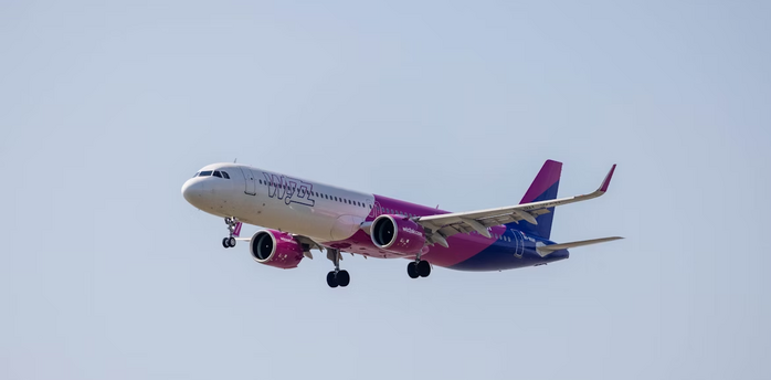 Commercial airplane flying against clear sky