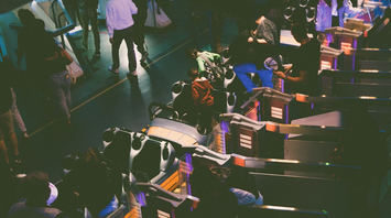 Passengers waiting in line at an airport boarding gate