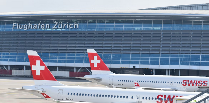 Swiss International Air Lines planes at Zurich Airport terminal