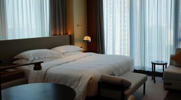 Modern hotel room with large windows