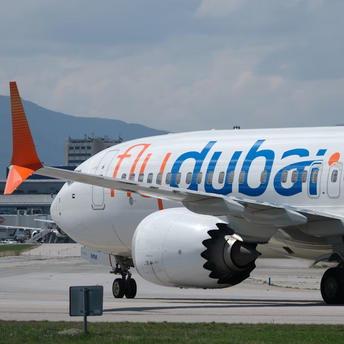 flydubai aircraft on airport tarmac preparing for departure