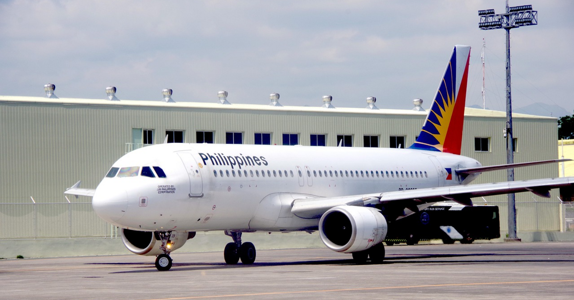 Philippine Airlines aircraft taxiing on the runway