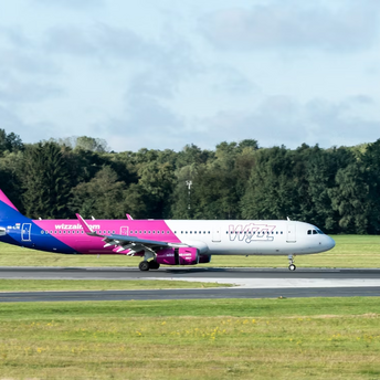 Wizz Air airplane taxiing on runway