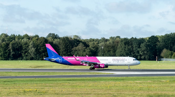Wizz Air airplane taxiing on runway