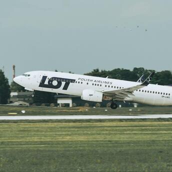 LOT Polish Airlines Boeing 737 taking off from runway