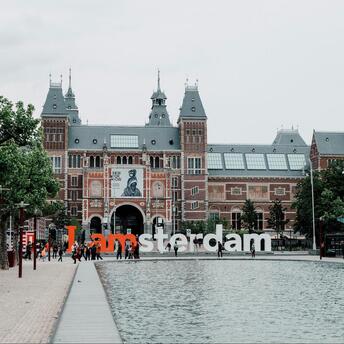 Rijksmuseum with I amsterdam sign and reflecting pool