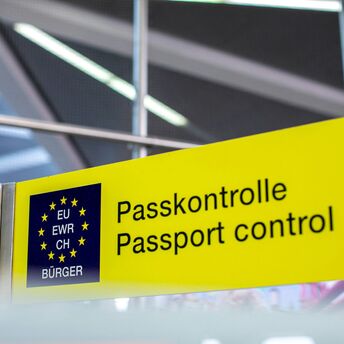 Passport control sign at a European airport