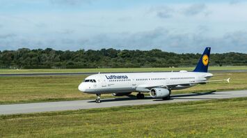 Lufthansa Airbus aircraft taxiing at an airport.