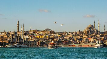 Panoramic view of Istanbul’s skyline with ferries crossing the Bosphorus