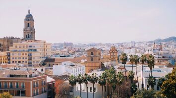 Daytime cityscape of Malaga with cathedral and residential buildings