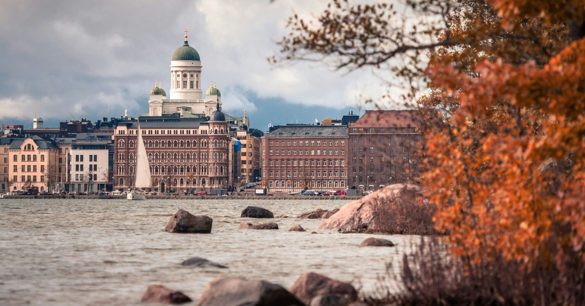 View of Helsinki Cathedral and waterfront buildings seen from the shoreline