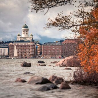 View of Helsinki Cathedral and waterfront buildings seen from the shoreline