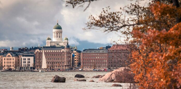 View of Helsinki Cathedral and waterfront buildings seen from the shoreline