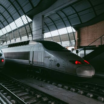 Renfe high-speed trains at a station platform