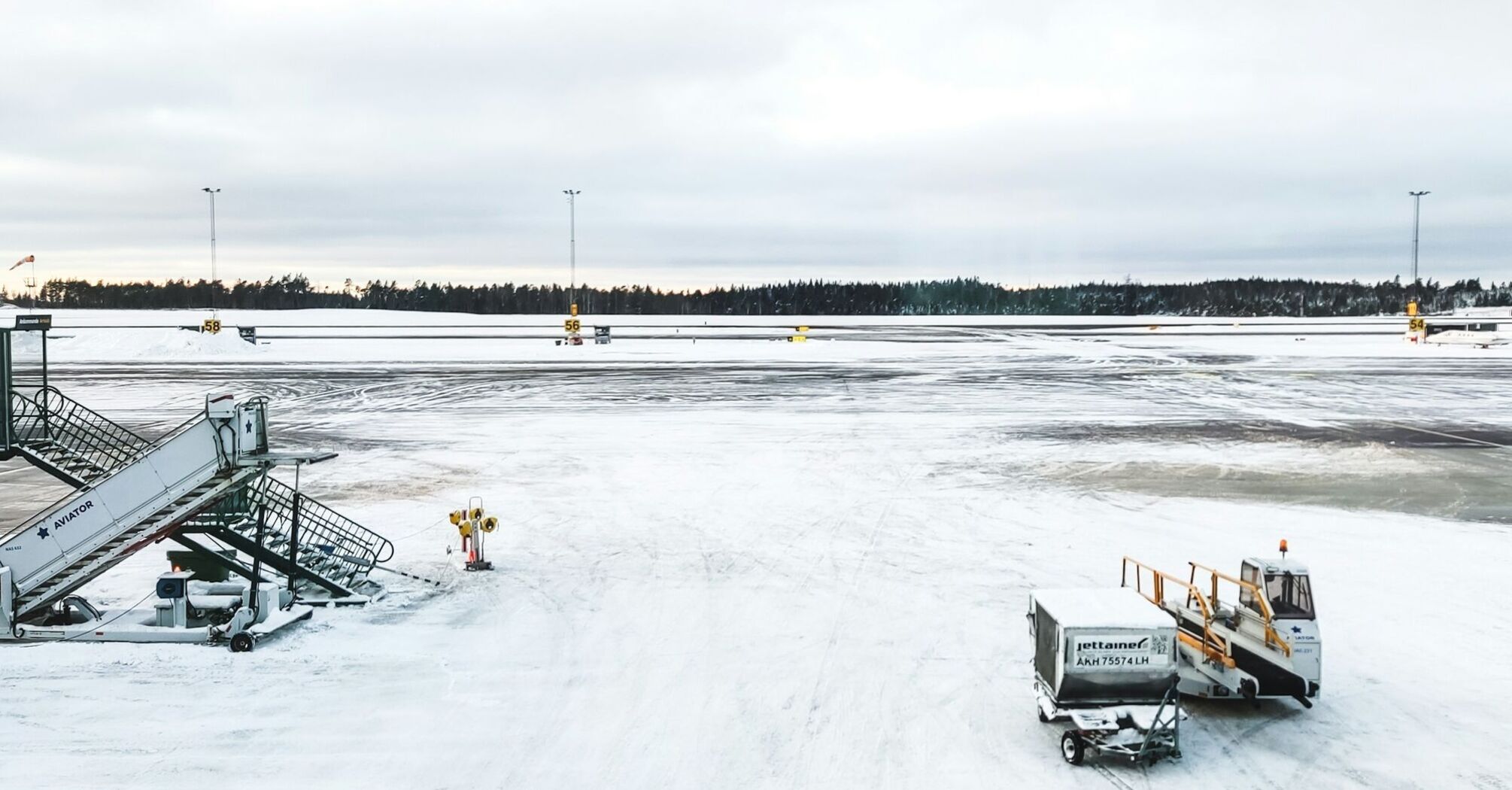 Snow-covered airport apron during winter weather