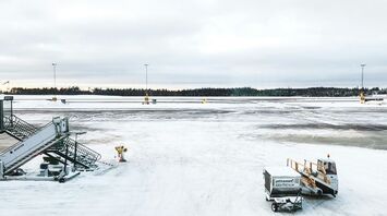Snow-covered airport apron during winter weather