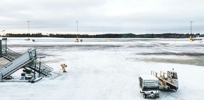 Snow-covered airport apron during winter weather