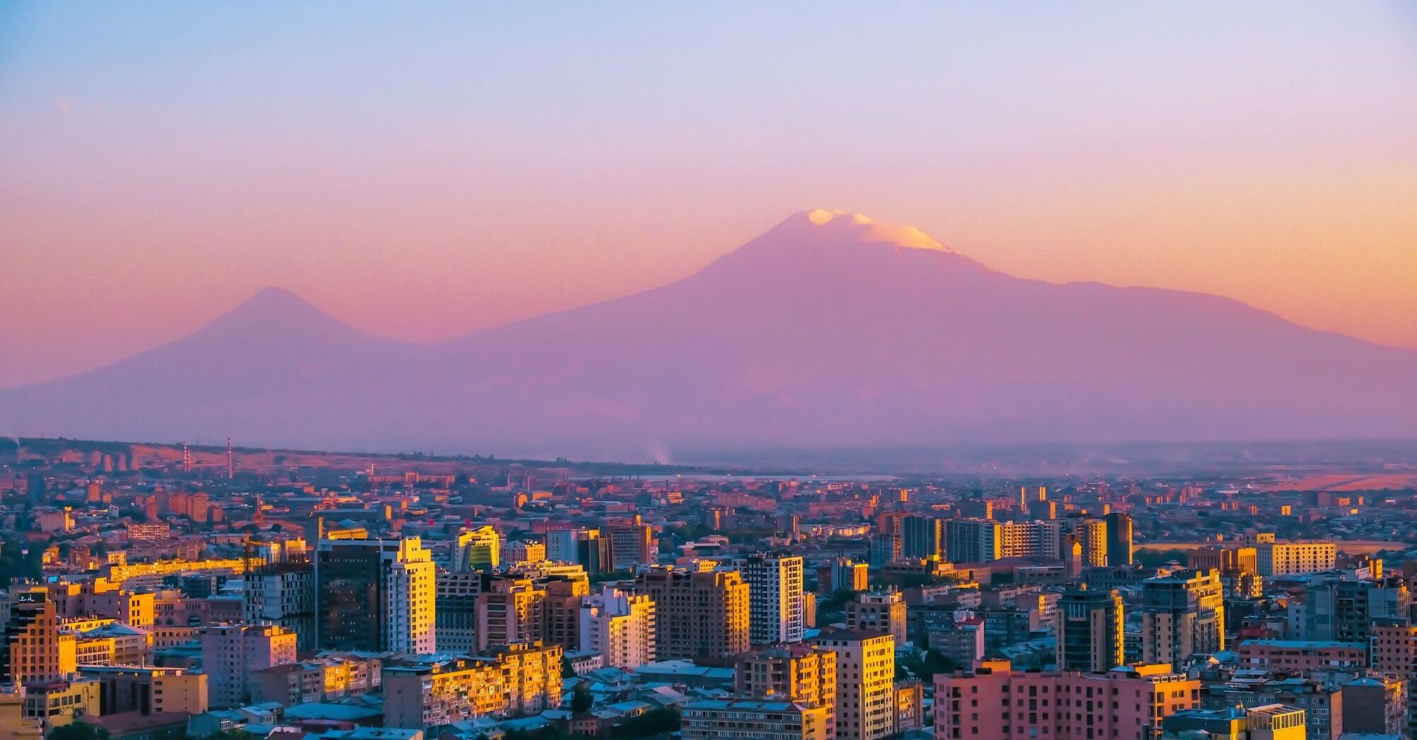 View of Yerevan at sunset with Mount Ararat in the background