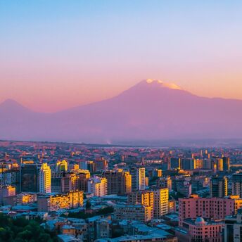 View of Yerevan at sunset with Mount Ararat in the background
