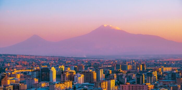 View of Yerevan at sunset with Mount Ararat in the background