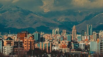 Tehran skyline backed by snow-capped mountains