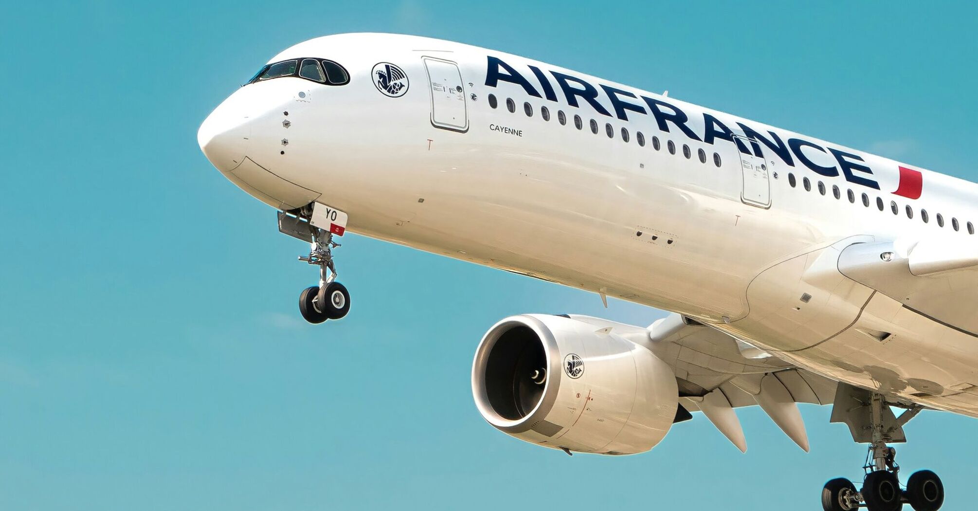 Air France aircraft on final approach against clear blue sky