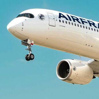 Air France aircraft on final approach against clear blue sky