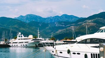 Montenegro marina with yachts and mountains