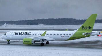 airBaltic aircraft taxiing during winter operations in the Baltics